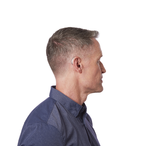 Side profile of middle aged man wearing hearing aids