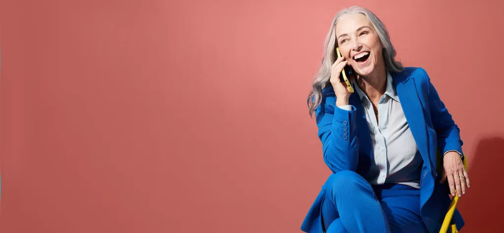 Senior woman laughing on the phone