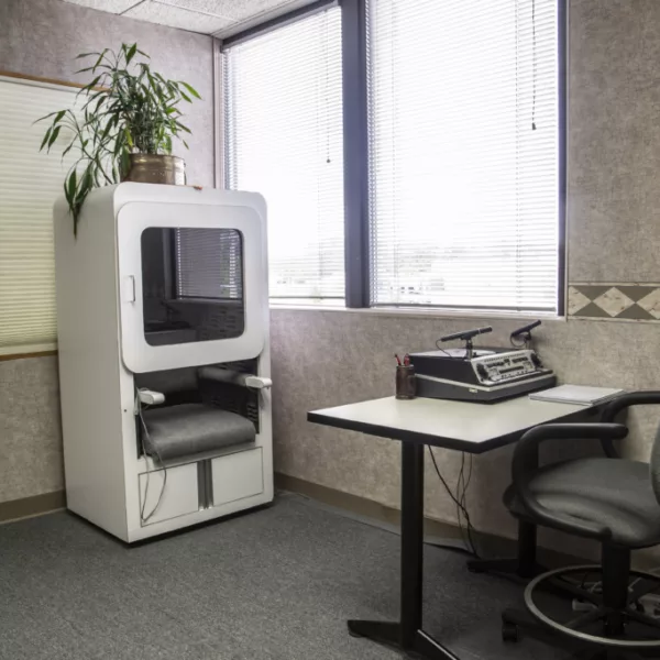 Office interior with hearing diagnostic equipment