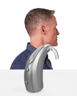 The side profile of a man wearing a Behind the Ear BTE hearing aid