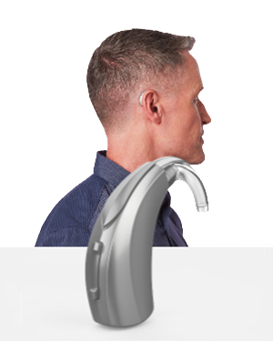 The side profile of a man wearing a Behind the Ear BTE hearing aid