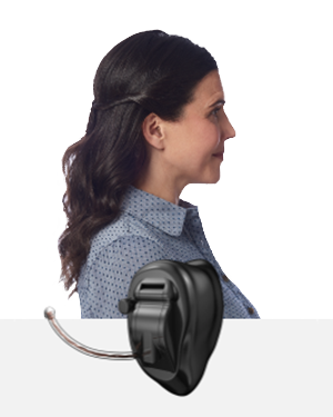 The side profile of a woman wearing a Completely-in-the-canal CIC hearing aid
