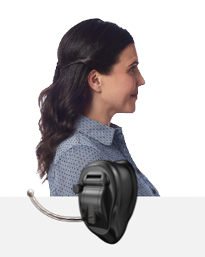 The side profile of a woman wearing a Completely-in-the-canal CIC hearing aid