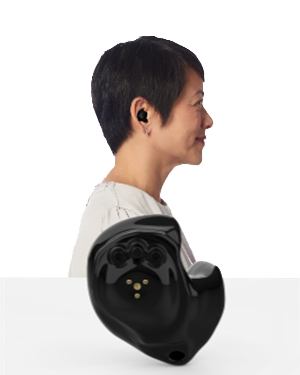 The side profile of a woman wearing an In-the-Ear ITE hearing aid