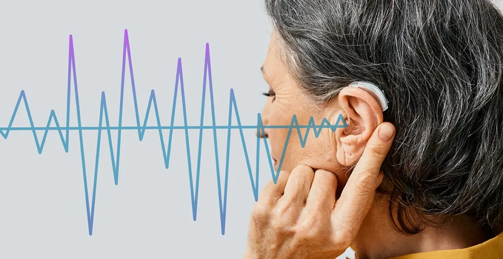 Older woman wearing behind the ear hearing aid with sound waves pattern in foreground, concept for hearing loss treatment