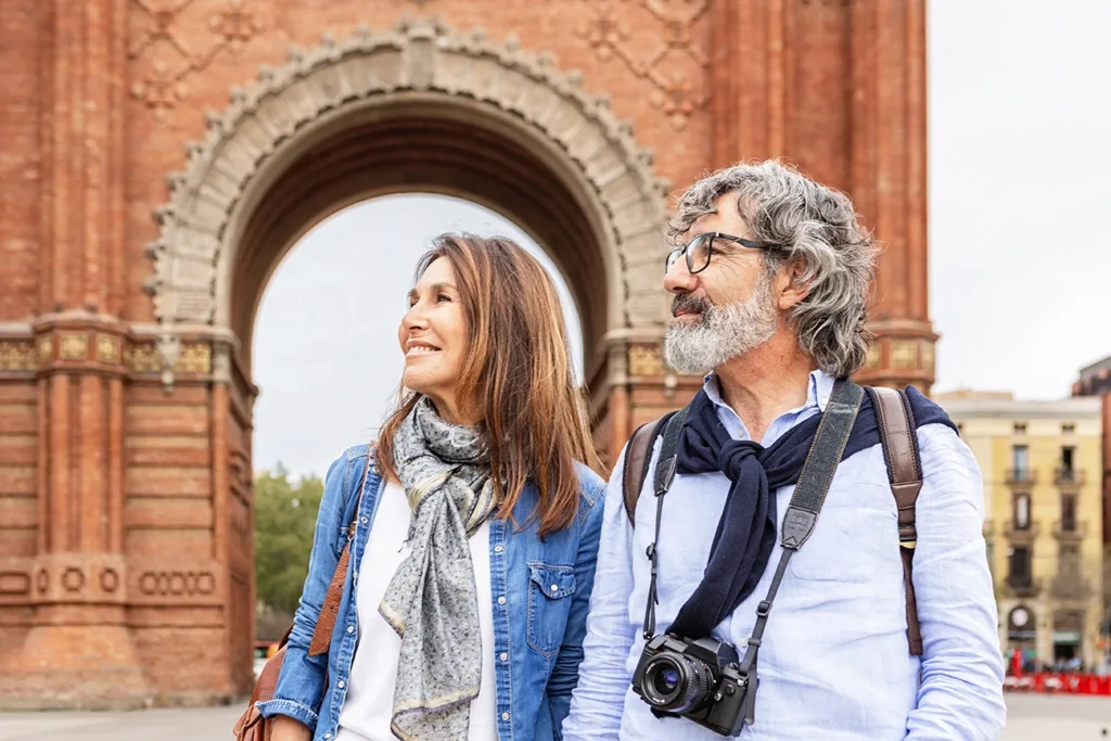 Happy, smiling older couple on vacation in Barcelona
